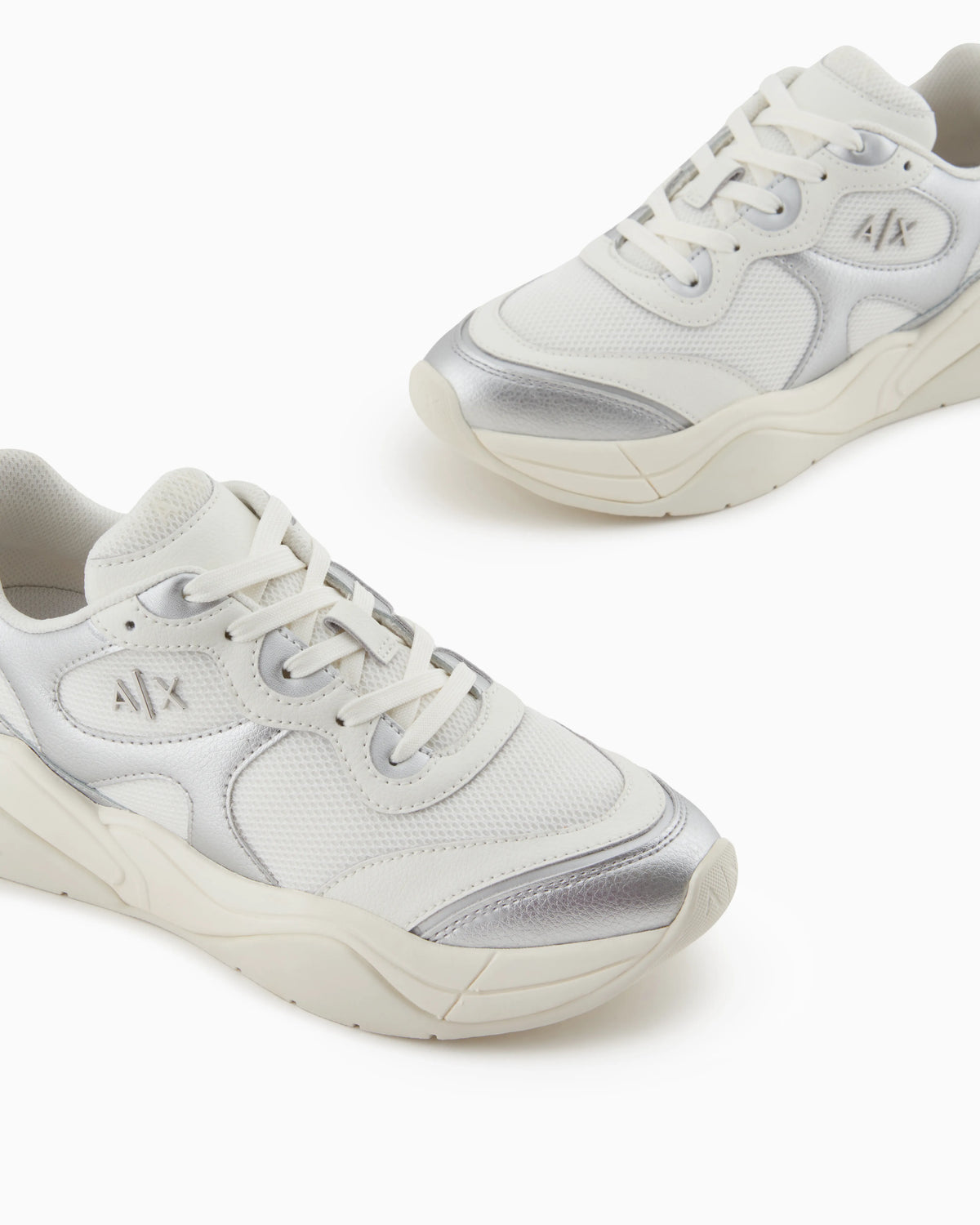 Sneakers with metallic inserts