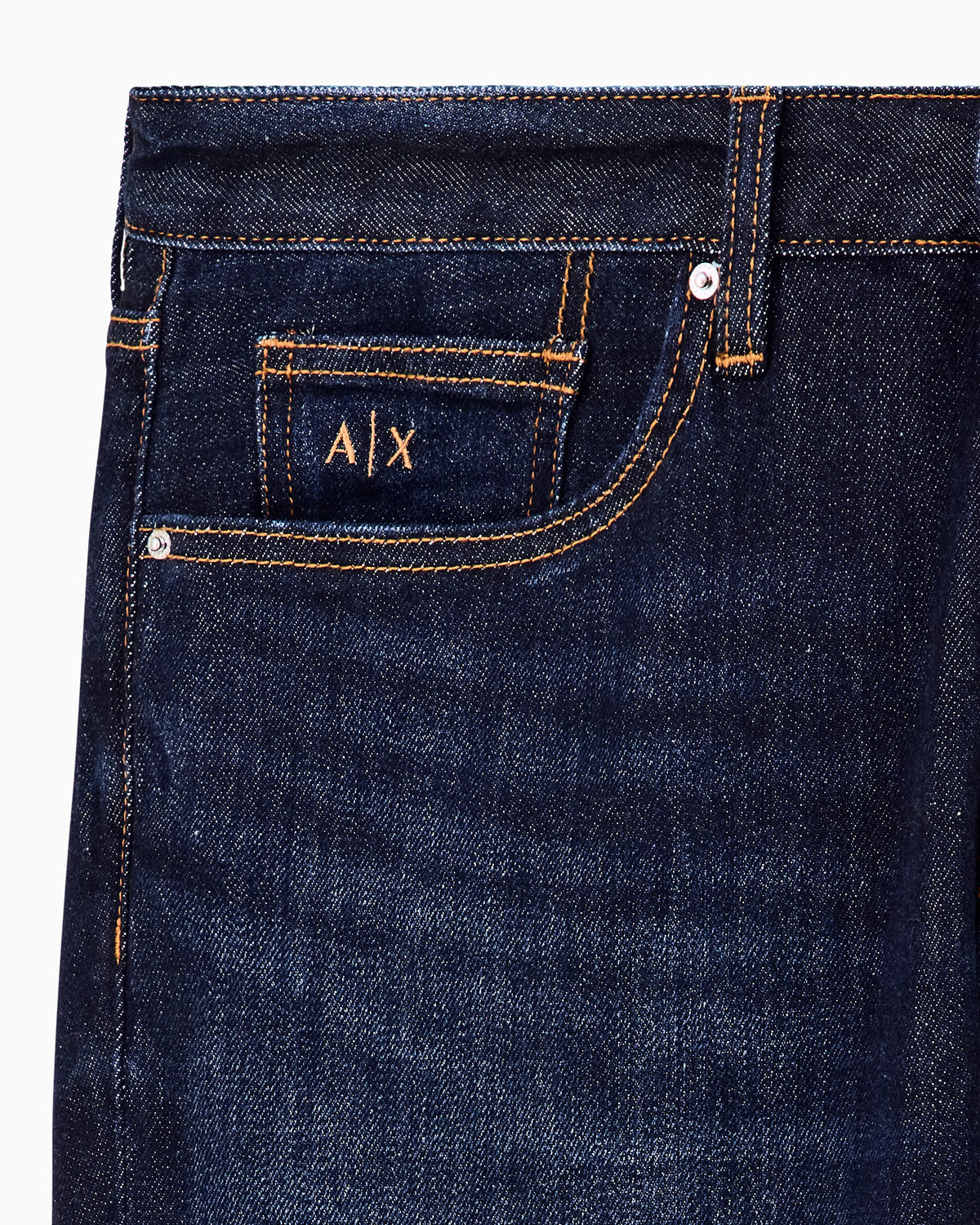 Slim-fit five-pocket denim jeans with a leather patch