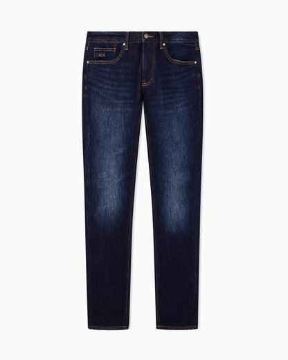 Slim-fit five-pocket denim jeans with a leather patch