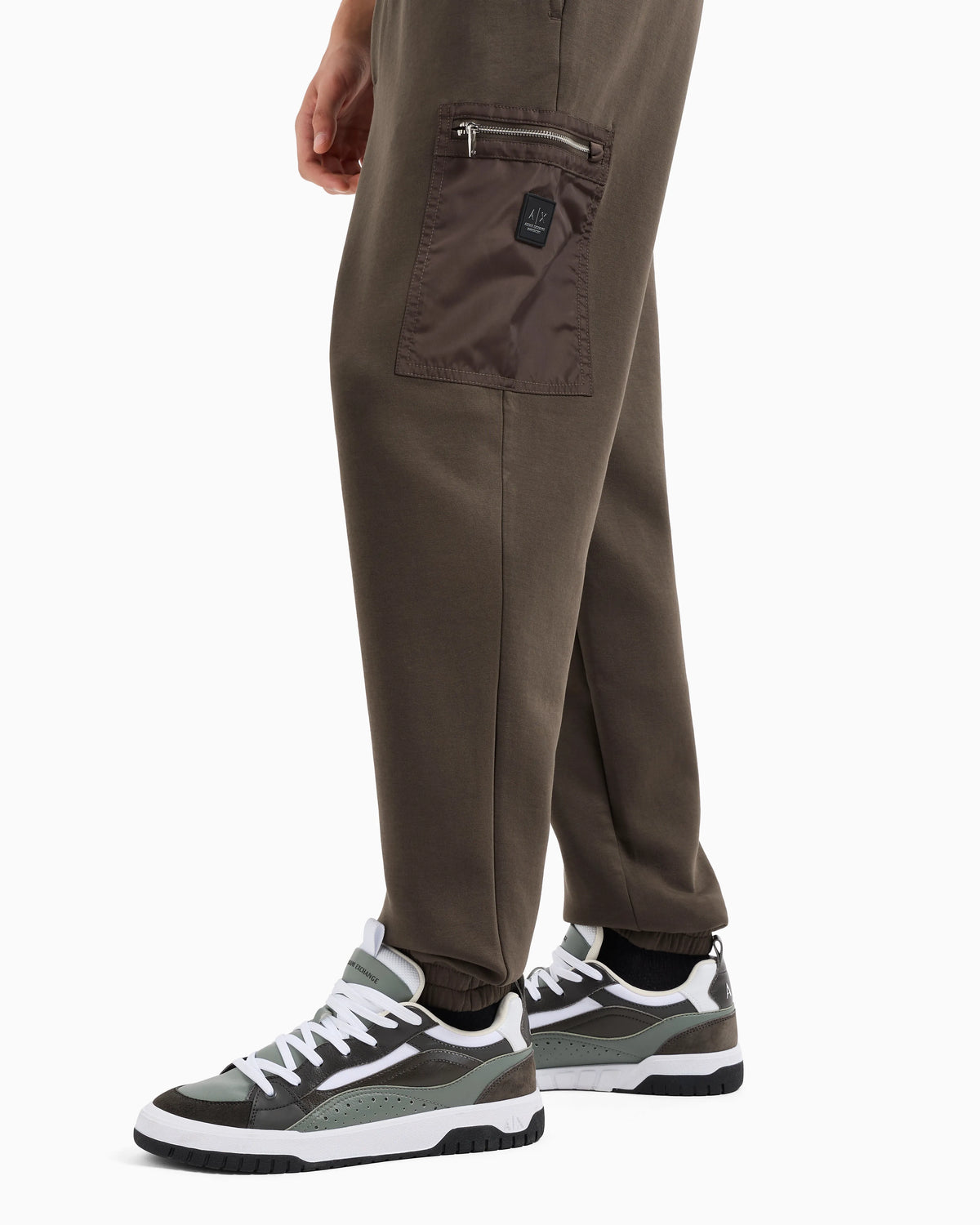 Oversized trousers with zip pocket