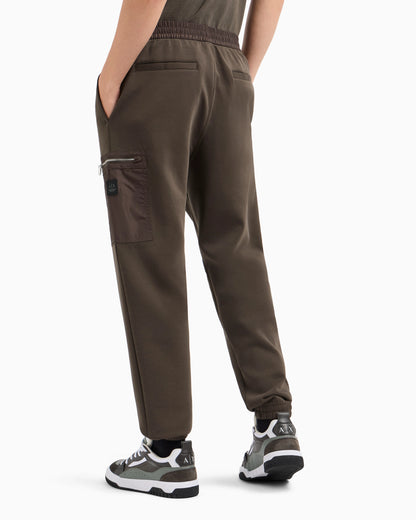 Oversized trousers with zip pocket