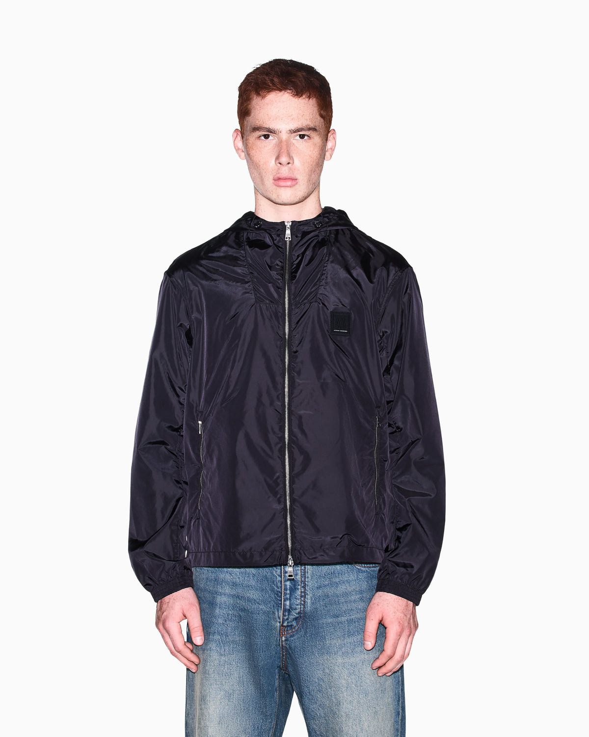 Hooded nylon windbreaker Icon with a zip and logo patch