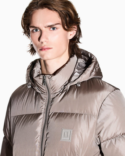 Shiny quilted puffer jacket with hood and down padding Icon