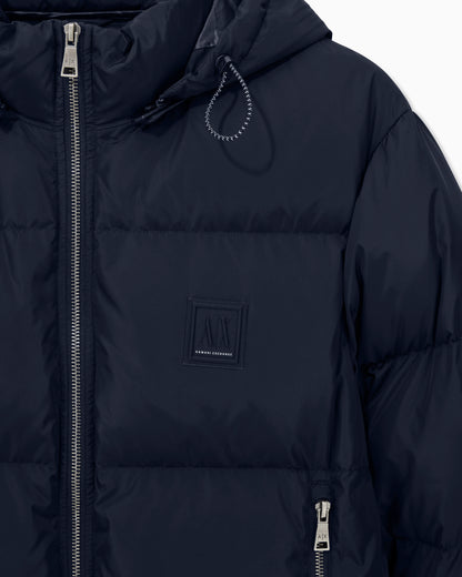 Shiny quilted puffer jacket with hood and down padding Icon