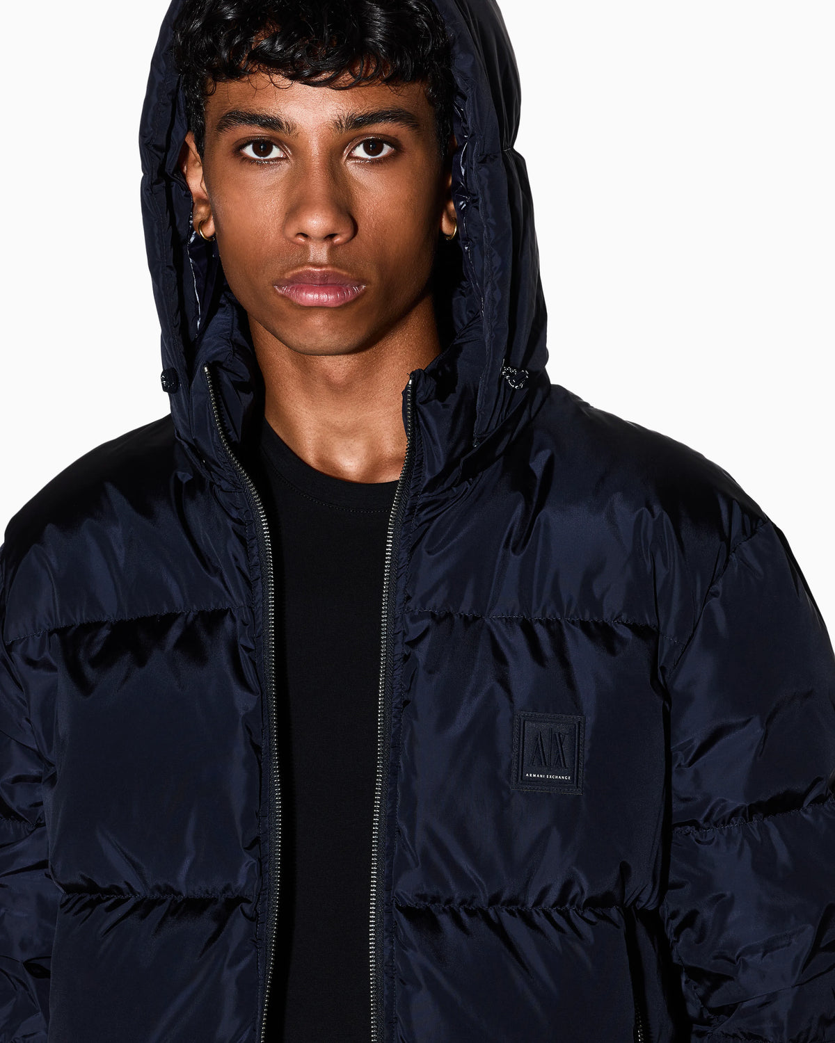 Shiny quilted puffer jacket with hood and down padding Icon