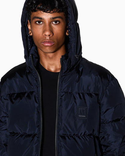 Shiny quilted puffer jacket with hood and down padding Icon