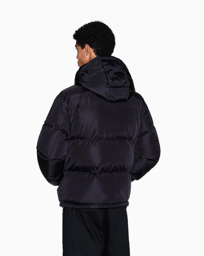 Shiny quilted puffer jacket with hood and down padding Icon