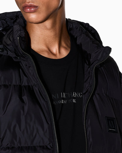 Shiny quilted puffer jacket with hood and down padding Icon