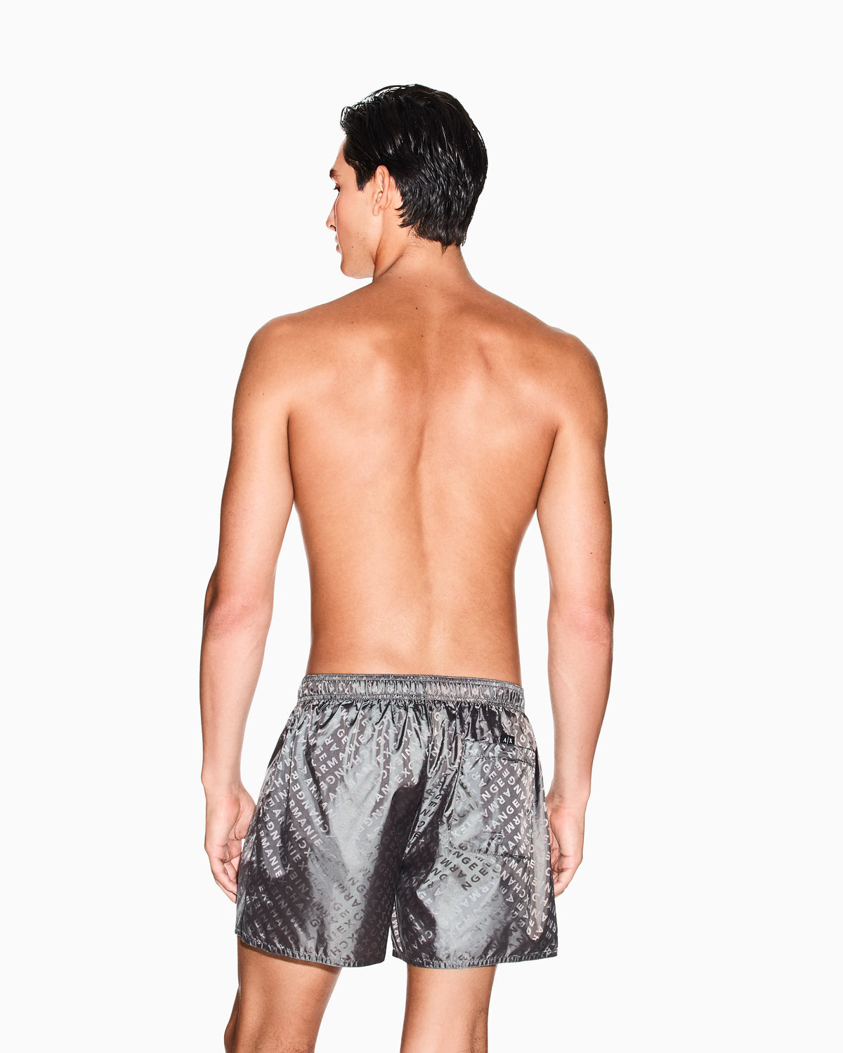ALLOVER LOGO SWIM TRUNKS