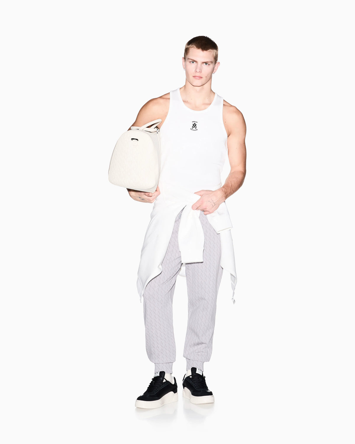 Jogger pants in cotton with all-over monogram Essential