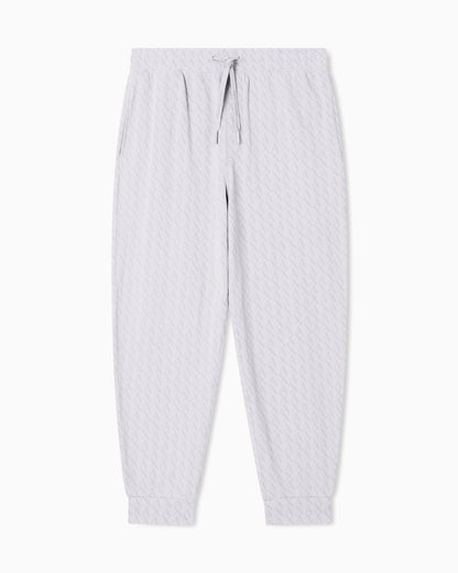 Jogger pants in cotton with all-over monogram Essential