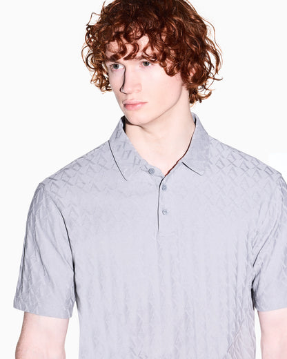 Textured polo shirt in mercerized cotton jersey Essential