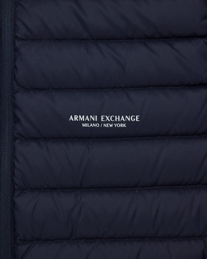 Quilted full-zip down vest with a high collar Essential