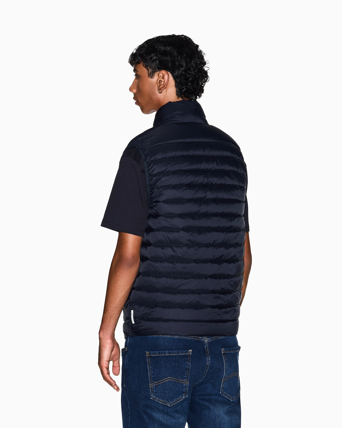 Quilted full-zip down vest with a high collar Essential