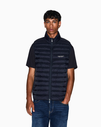 Quilted full-zip down vest with a high collar Essential
