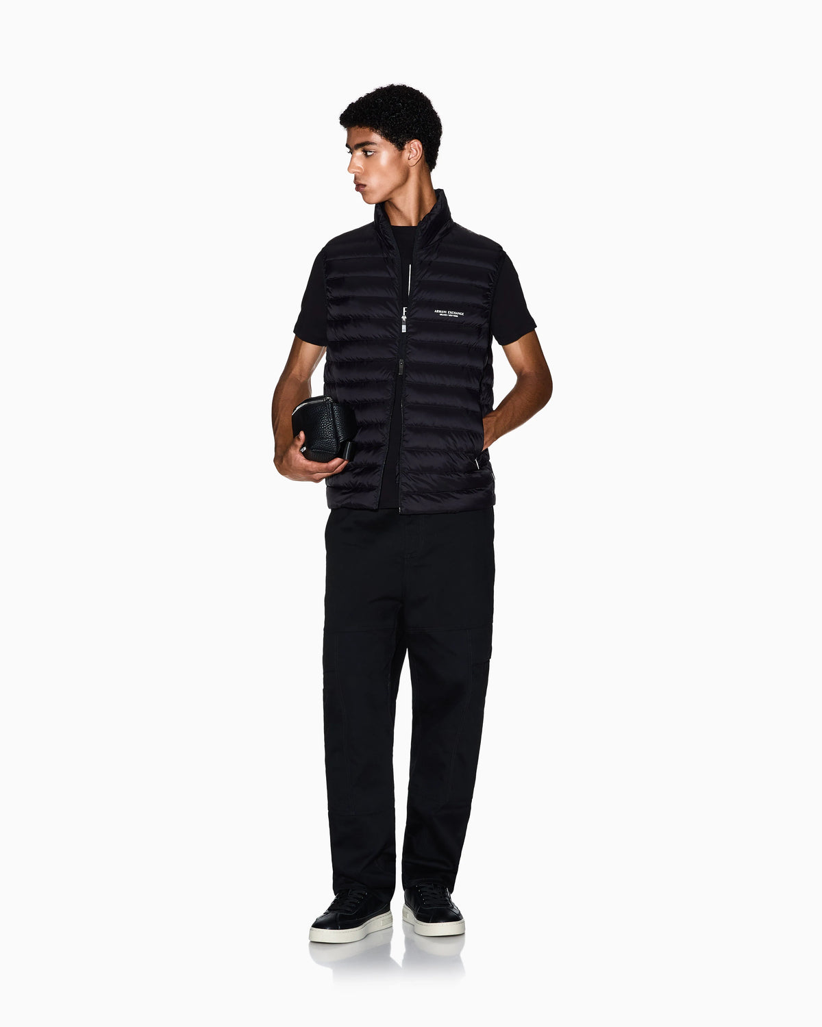Quilted full-zip down vest with a high collar Essential