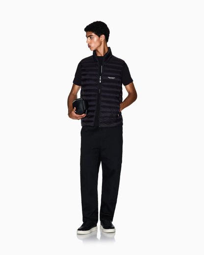 Quilted full-zip down vest with a high collar Essential