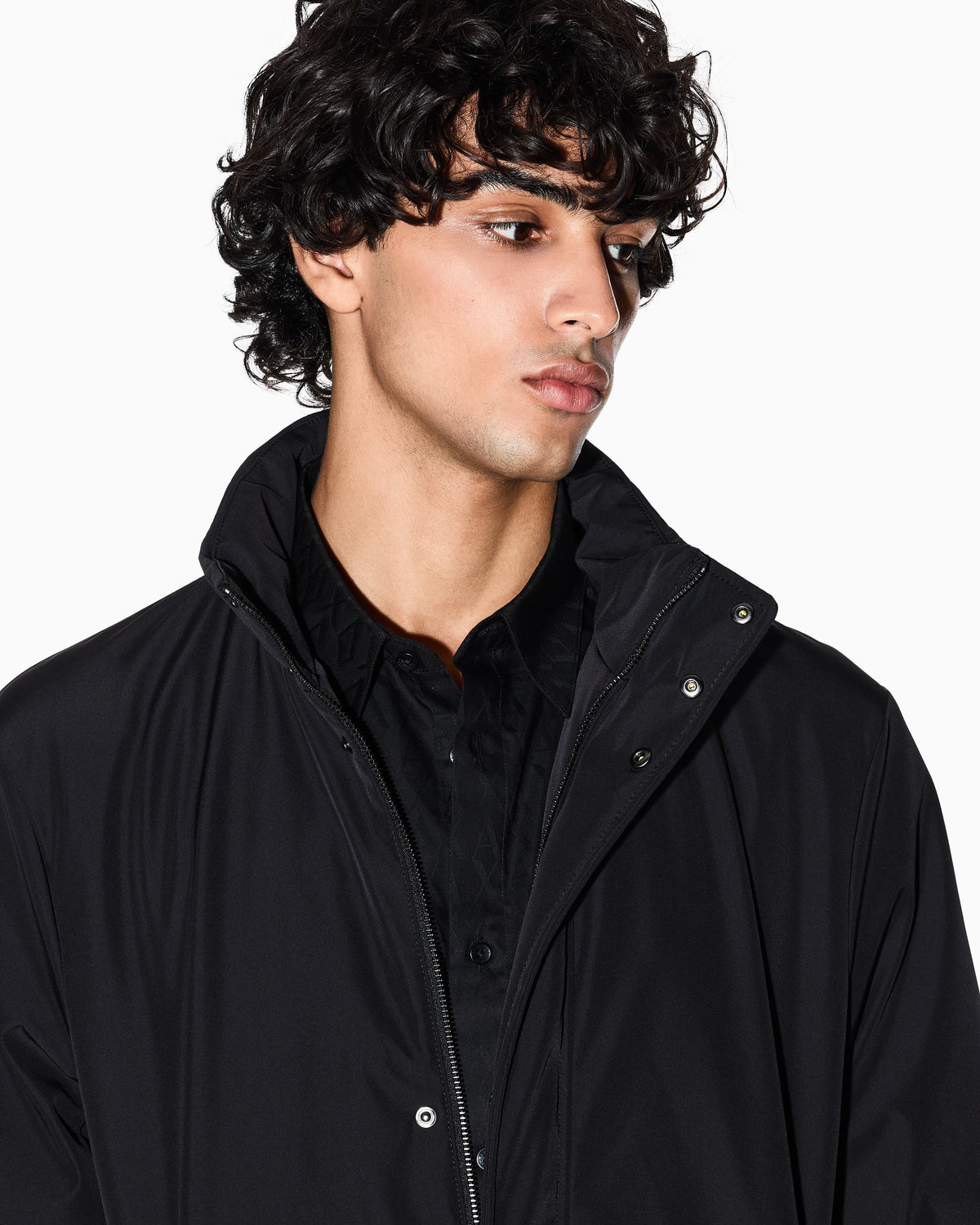 Overcoat with a high collar and concealed zipper Essential