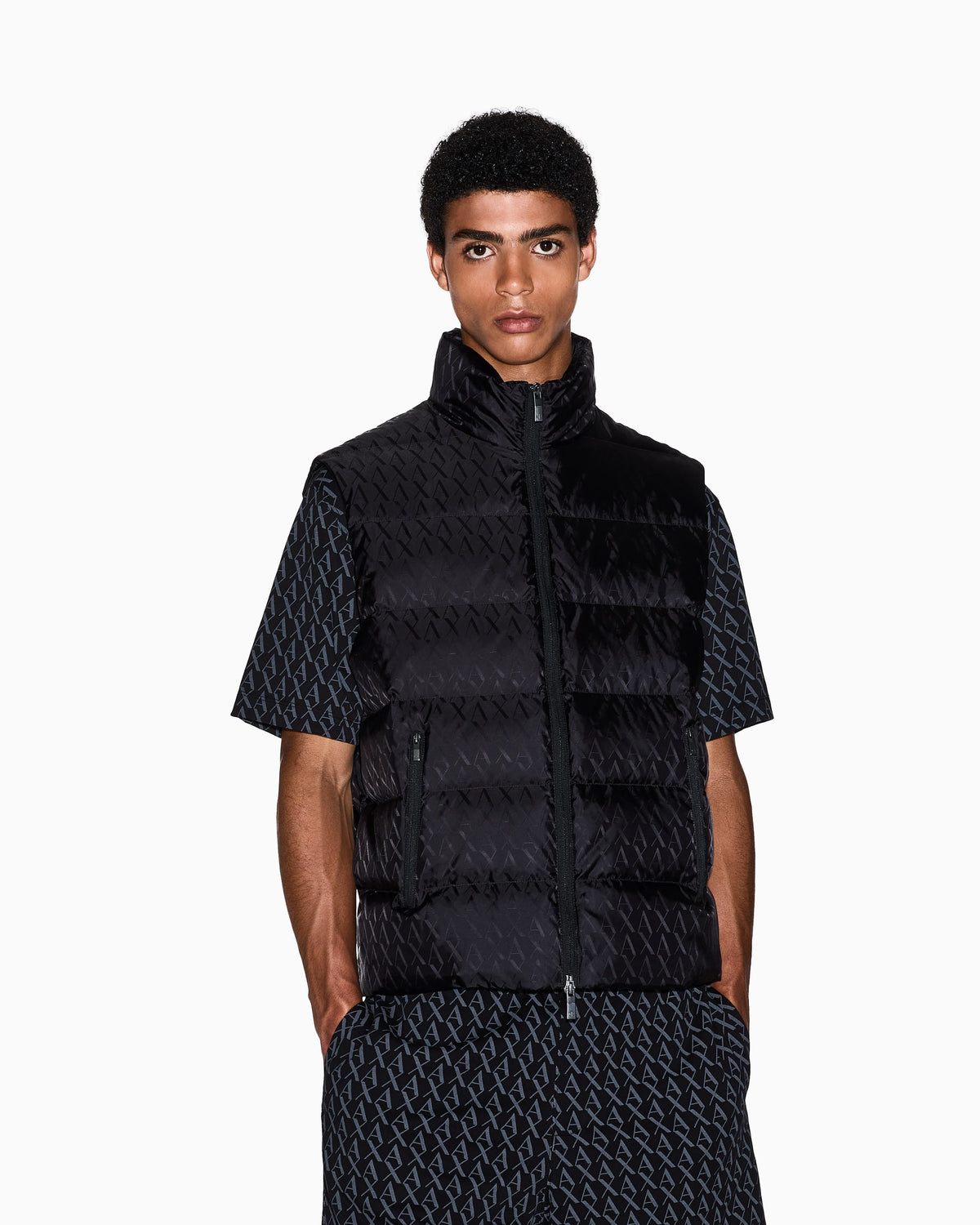 Sleeveless top  in padded jacquard nylon