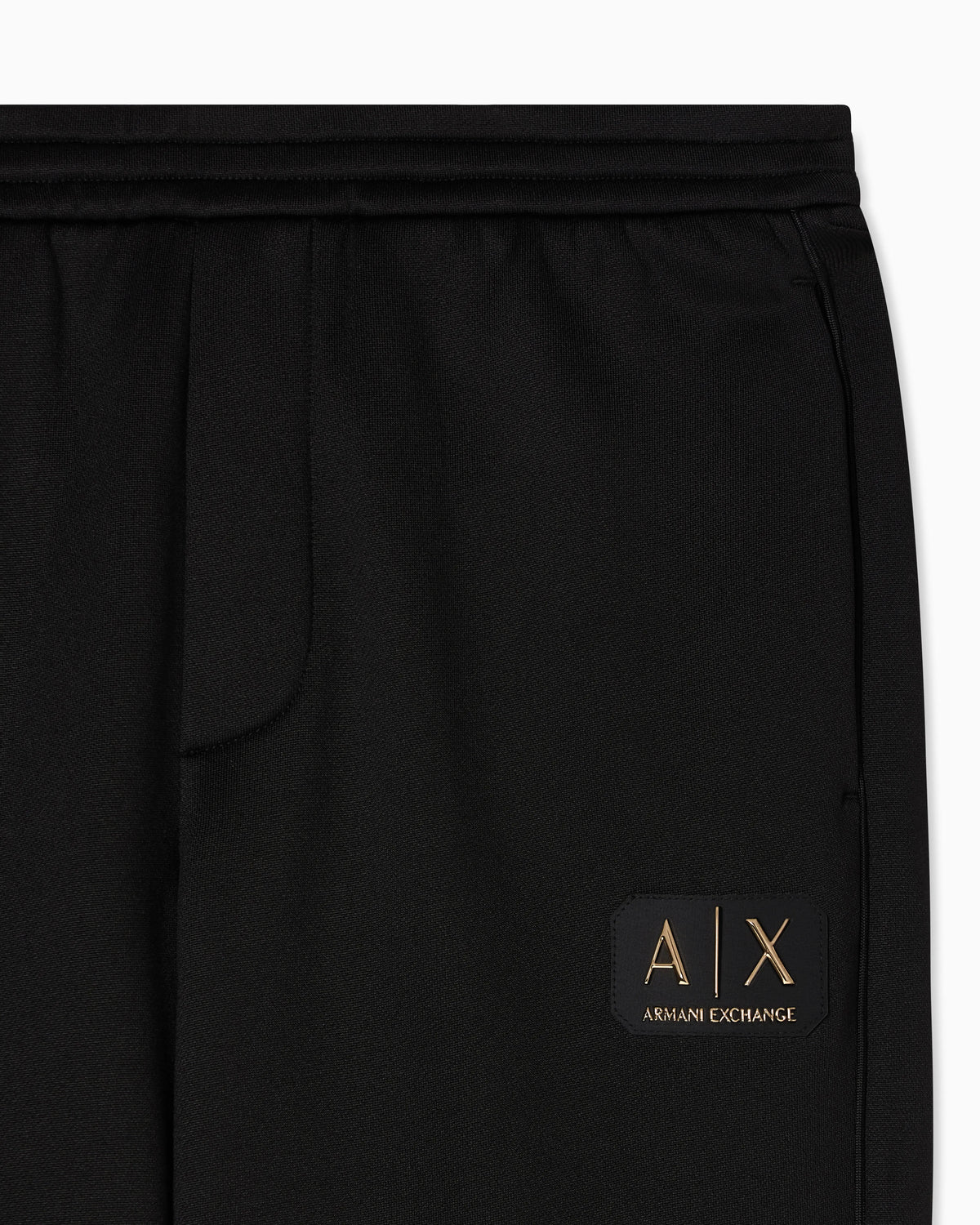 Jogger pants with metal logo