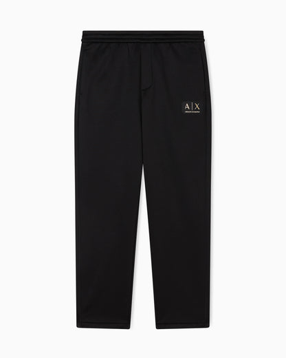 Jogger pants with metal logo