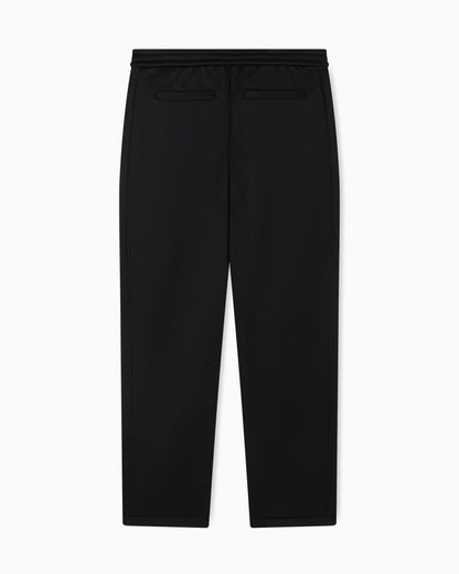 Jogger pants with metal logo