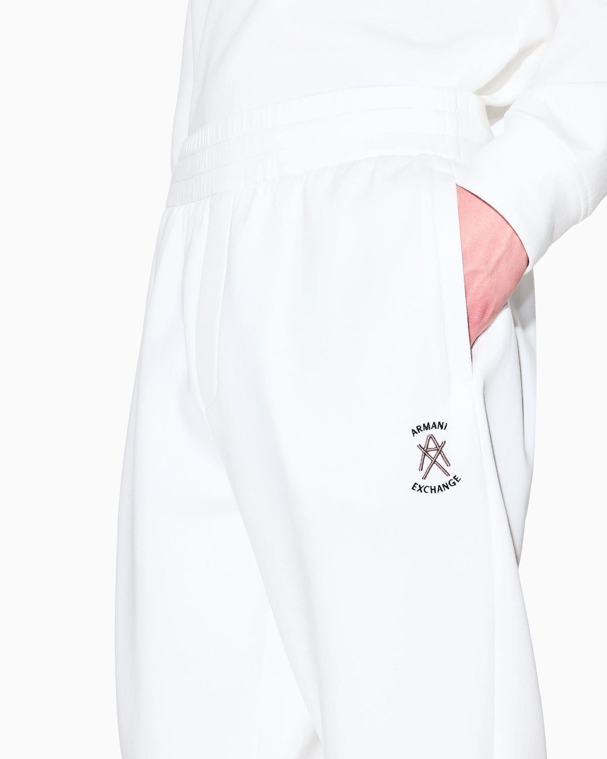Jogger pants with metal logo