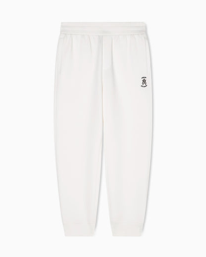 Jogger pants with metal logo