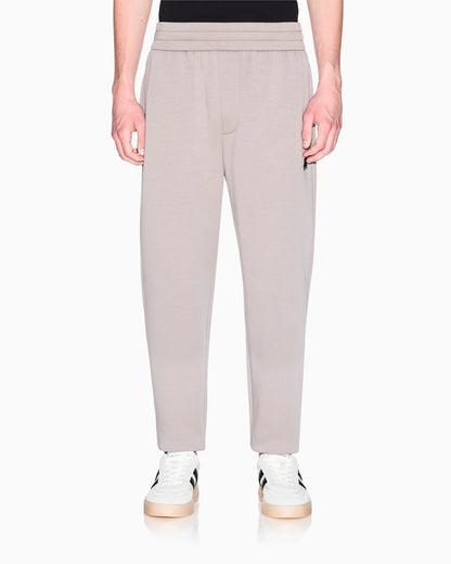 Jogger pants with metal logo