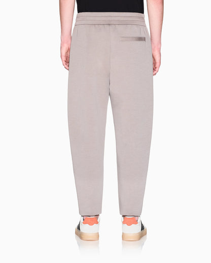 Jogger pants with metal logo