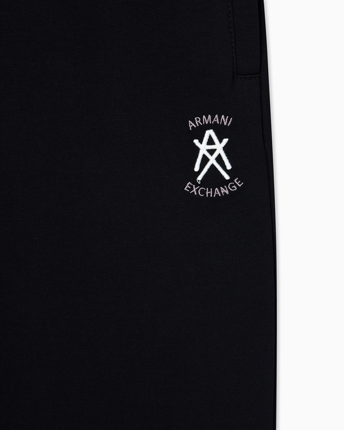 Jogger pants with metal logo