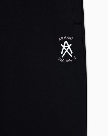 Jogger pants with metal logo