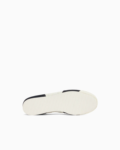 Lace-up sneakers in suede and mesh with a rubber sole
