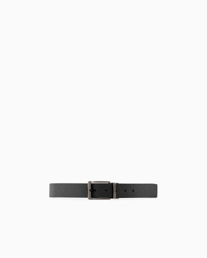 Leather belt with embossed logo pattern and metal buckle