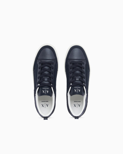 Sneakers in suede with all-over logo and rubber sole