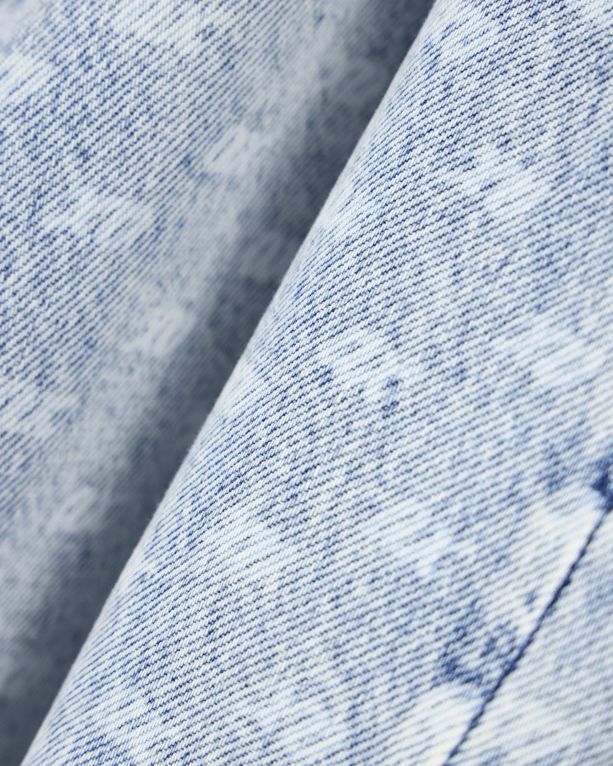 Oversized five-pocket denim pants with an allover print