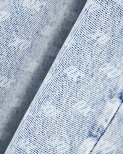 Oversized five-pocket denim pants with an allover print