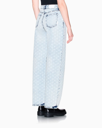 Oversized five-pocket denim pants with an allover print