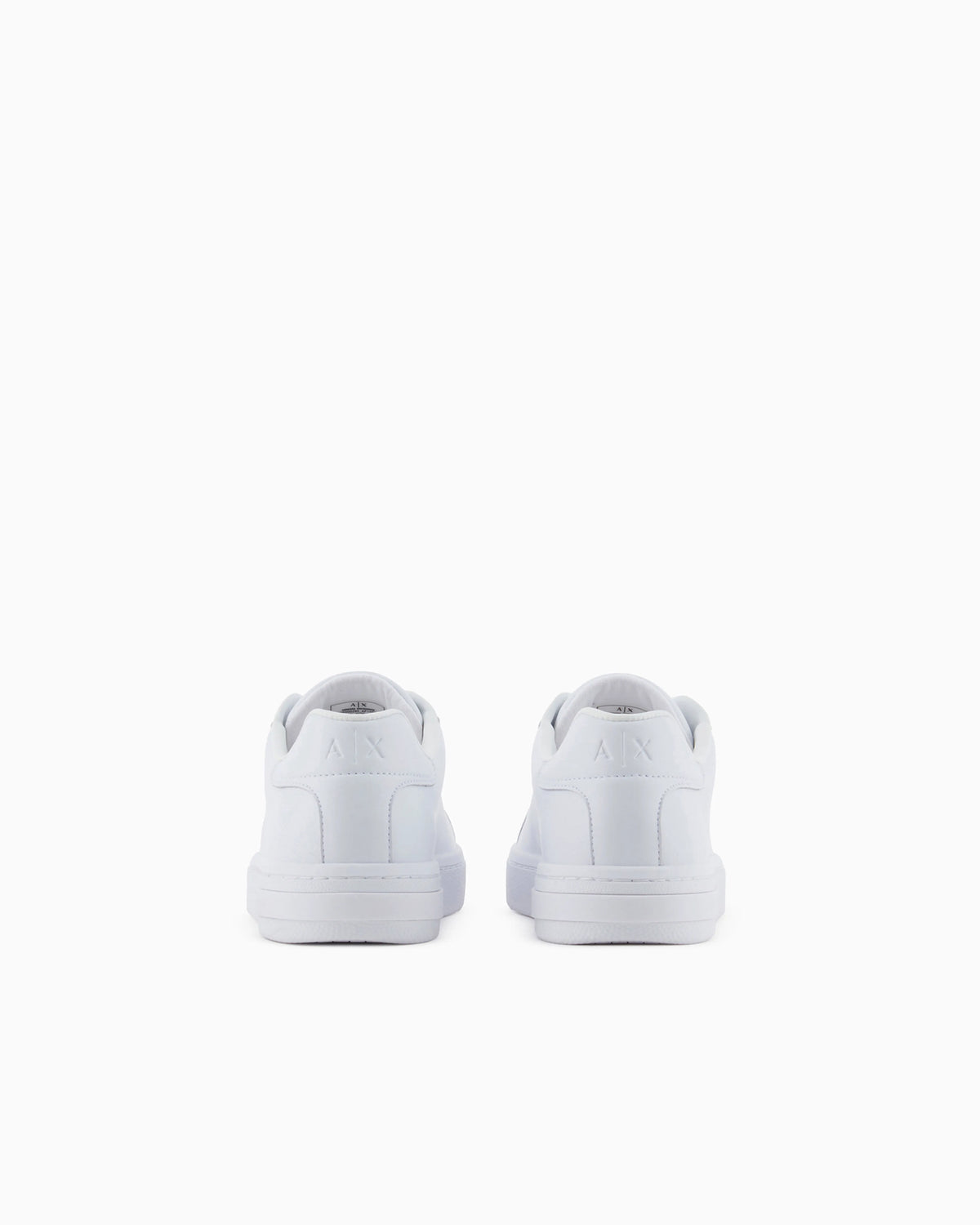 Low-top sneakers in smooth leather with an embossed logo