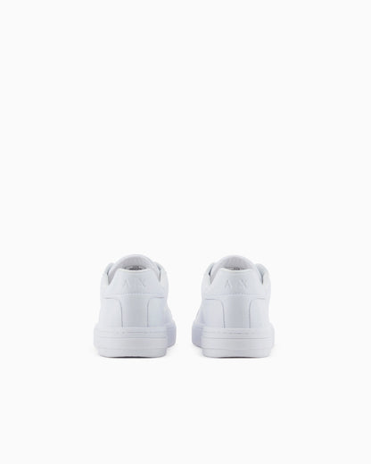 Low-top sneakers in smooth leather with an embossed logo
