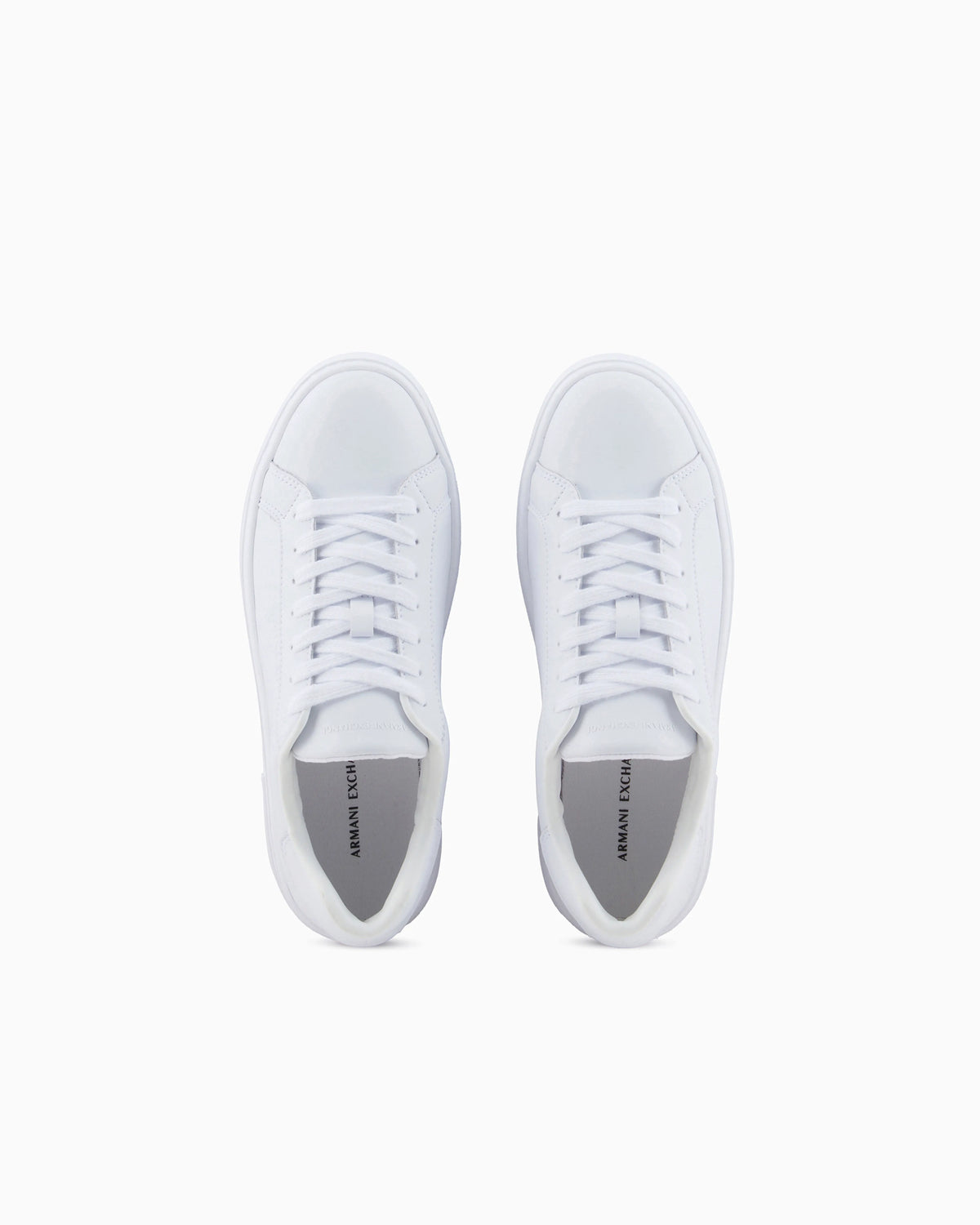 Low-top sneakers in smooth leather with an embossed logo