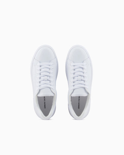 Low-top sneakers in smooth leather with an embossed logo