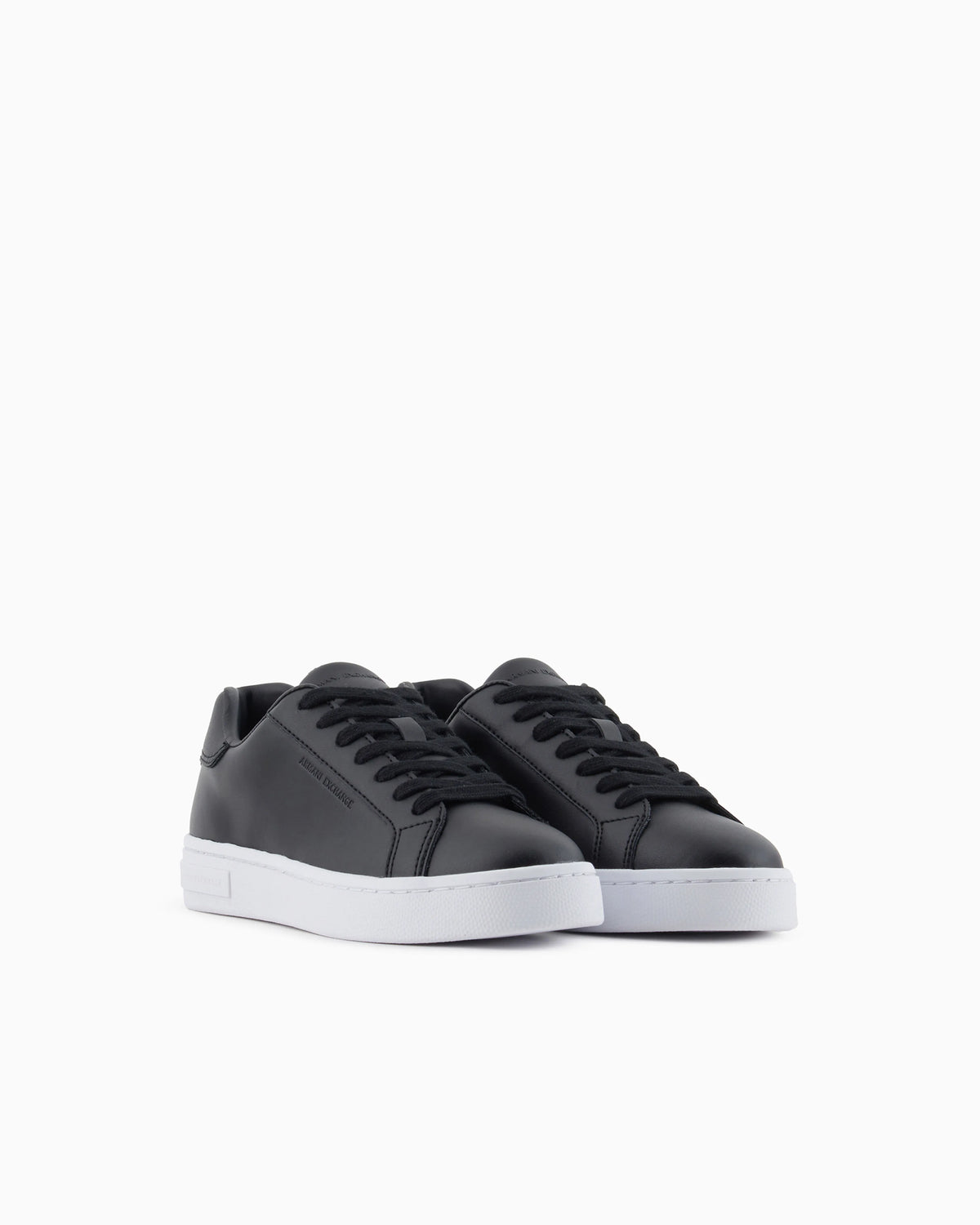 Low-top sneakers in smooth leather with an embossed logo