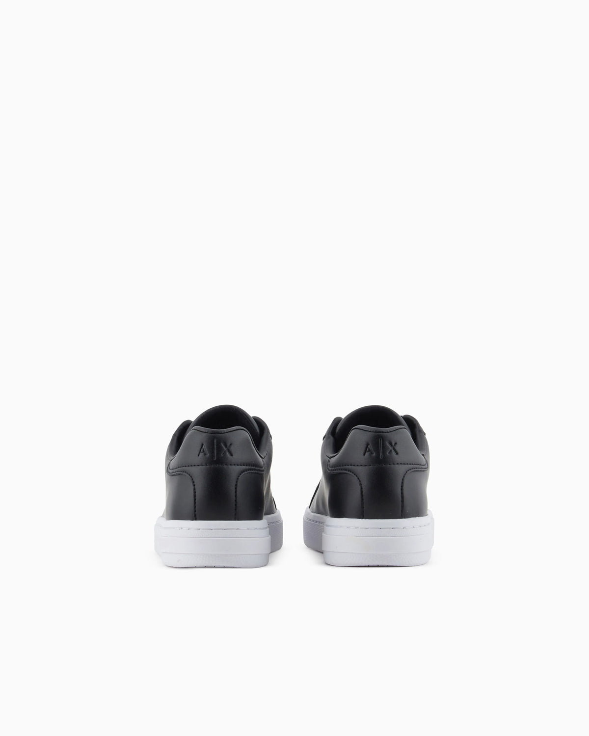 Low-top sneakers in smooth leather with an embossed logo