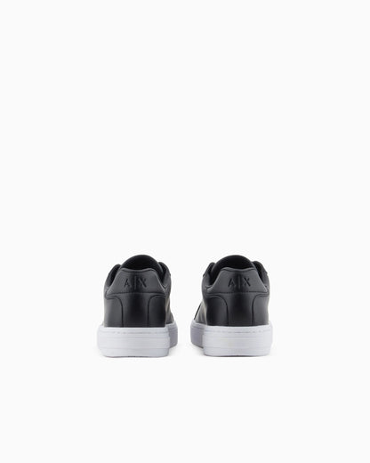 Low-top sneakers in smooth leather with an embossed logo