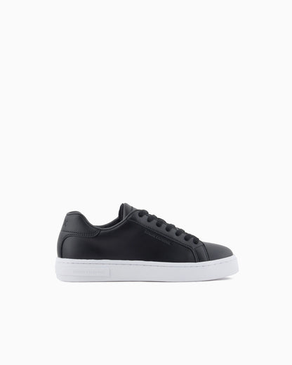 Low-top sneakers in smooth leather with an embossed logo