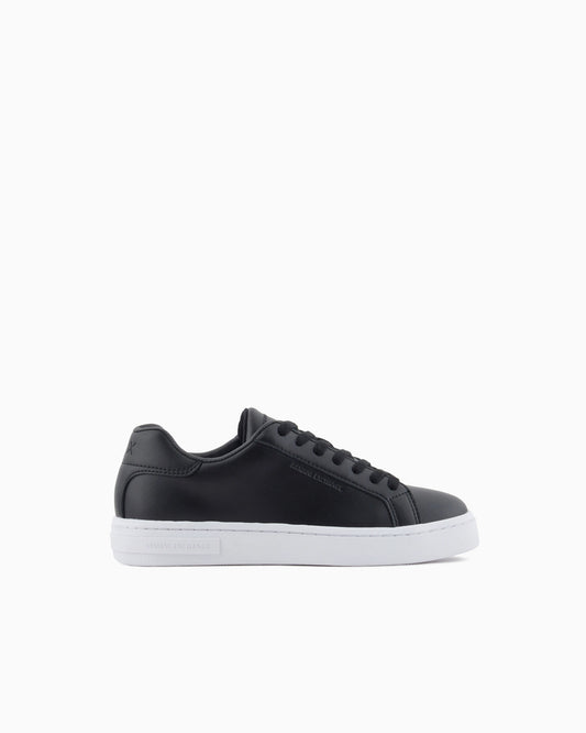 Low-top sneakers in smooth leather with an embossed logo