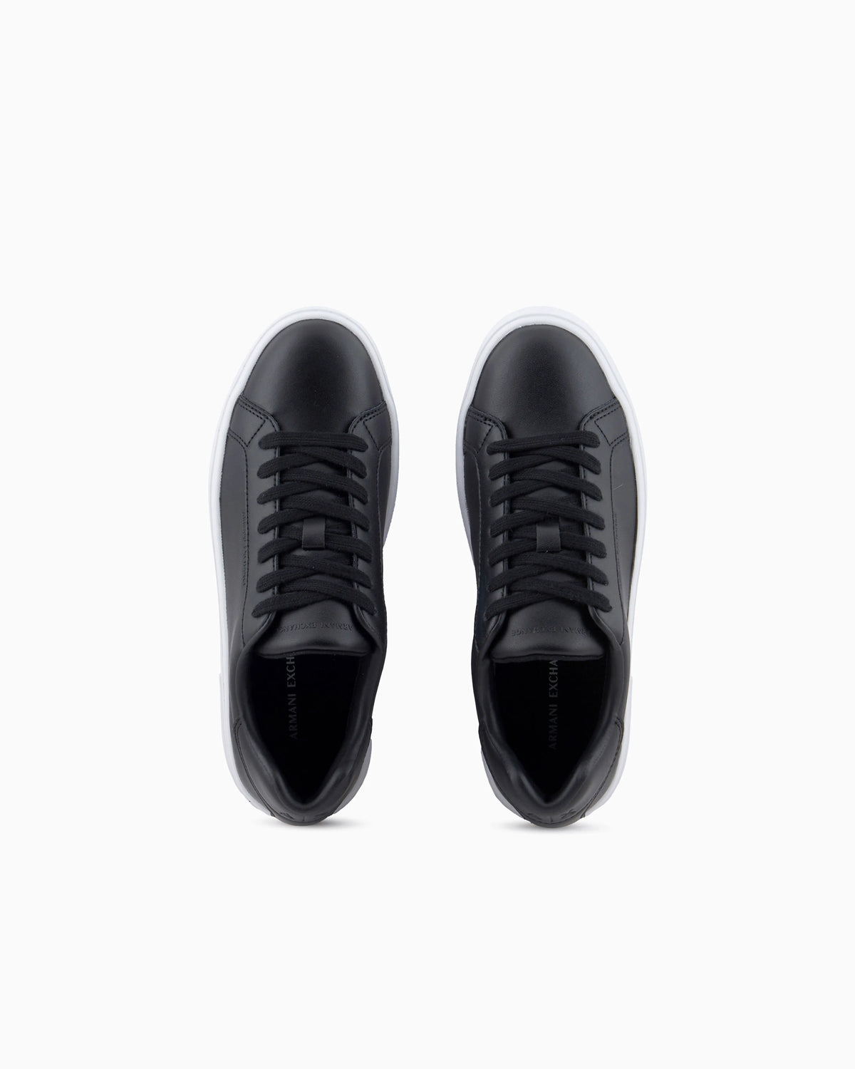 Low-top sneakers in smooth leather with an embossed logo