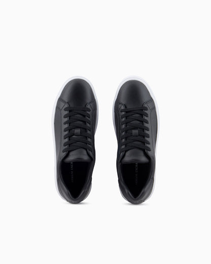 Low-top sneakers in smooth leather with an embossed logo