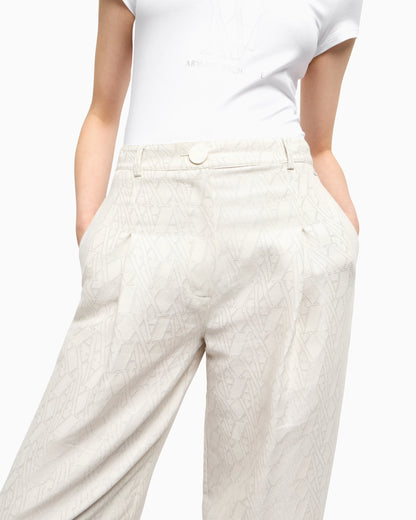 Pleated trousers with allover logo